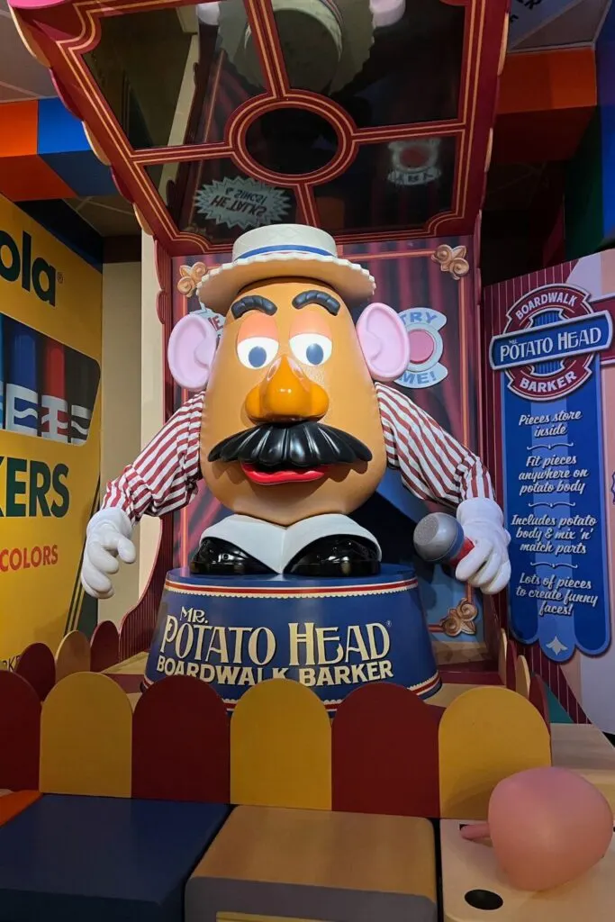 Photo of a giant Mr. Potato Head in the queue for Toy Story Mania at Hollywood Studios' Toy Story Land.