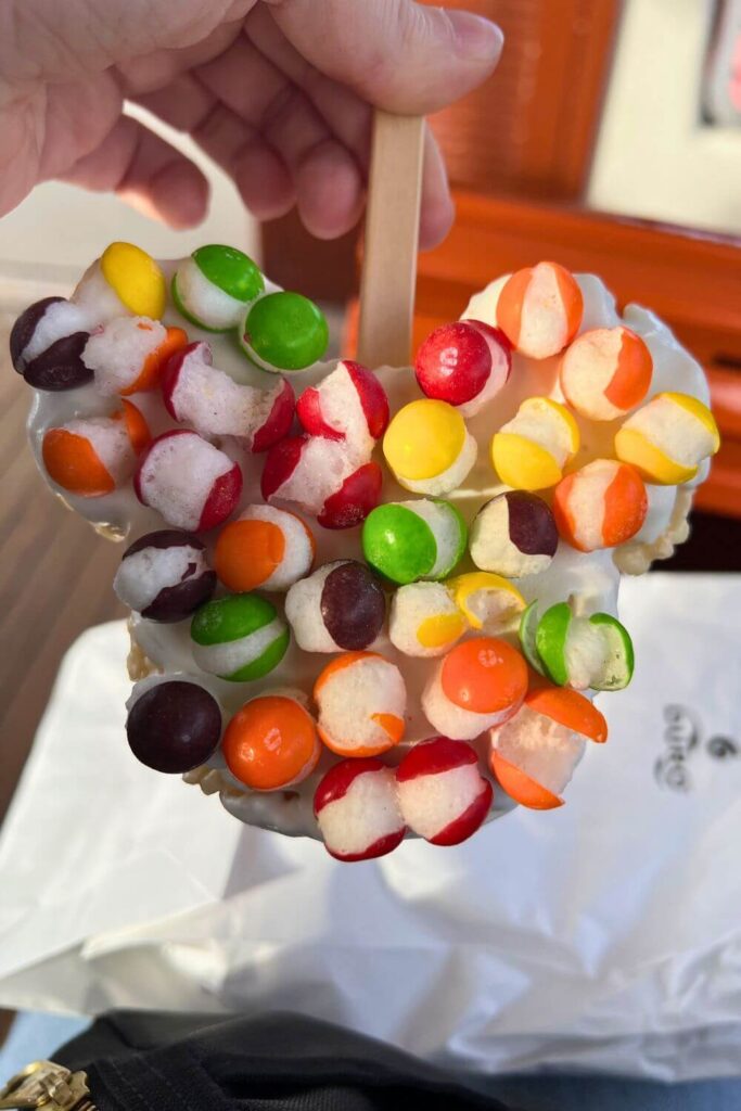 Closeup of a Mickey Rice Krispy Treat with Freeze Dried Skittles from Main Street Confectionary at Magic Kingdom.