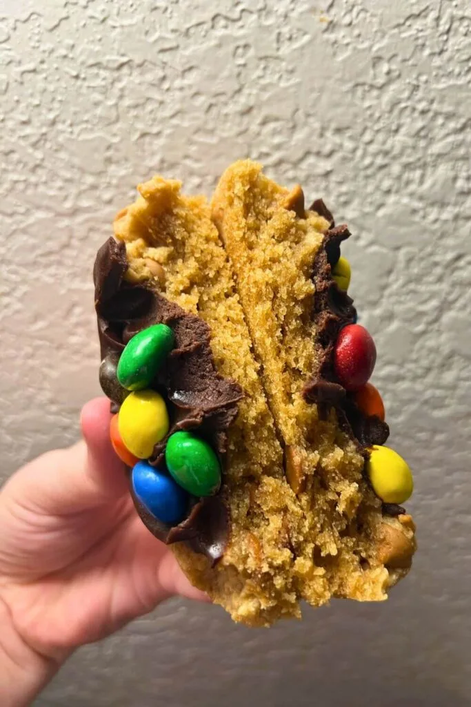 Closeup of the peanut butter cookie pie from Main Street Confectionary cut in half.